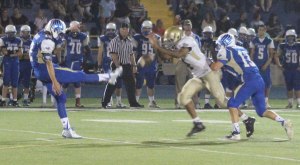 Klyde Auba blocks a punt