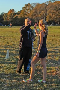 Maddie gets five from Coach Joe Colbert