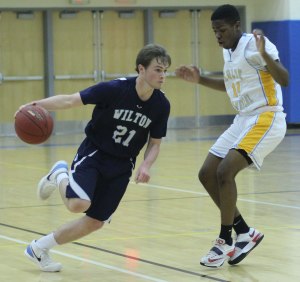 Jack Williams tries to get past Anthony Senior