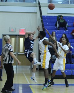 Drew Connolly (18 points) tries to pass out of a Kolbe Cathedral trap