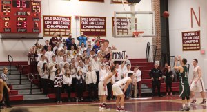 Conor O'Neil attempts a free throw in front of the Newburyport student section