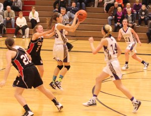 Claire Olmstead (#15) intercepts a Panthers' pass