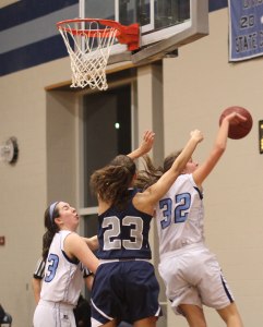 Alex Kennedy (32) blocks
