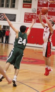 Ryan Foley (15 points) launches a three