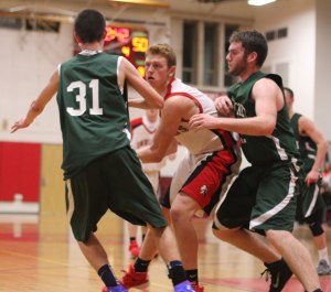 Spencery Pacy (#31) and Ben Thornton (#51) double-team Dan Welch