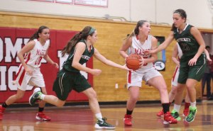 Lily Polakiewicz draws two defenders