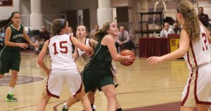 Boo Torrisi (11 points) gets into the lane