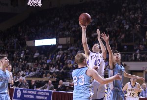 Matthew Wulbrecht (14 points) finds space in a double-team