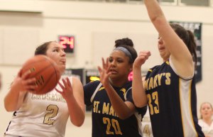 Fredi DeGuglielmo (14 points) defended by Kayla Carter and Katie Dixon