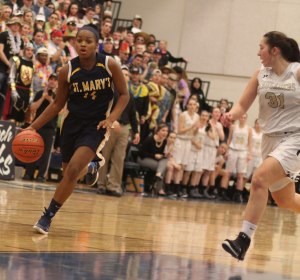 Marnelle Garround chased by Sydney Brennan