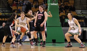 Marissa Gattuso faces two defenders