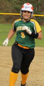 Sophomore Tara Driver smiles her way around the bases after hitting a 3-run homer in the sixth inning