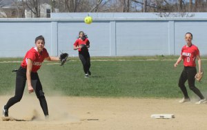 Shortstop Maddie Napoli fires to first base