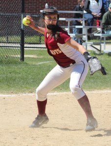 Patriots reliever Nicole Small prepares to throw to first base