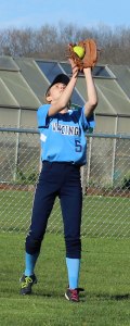 Shannon Lyons catches a fly ball.