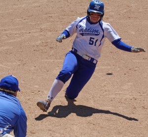 Aly LeBlanc about to reach third after driving in the go-ahead run for Madison