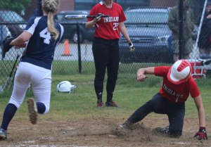 Maddie Napoli scores the 5th AHS run on a wild pitch