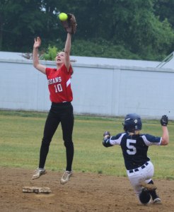 Senior 2B Lauren Fedorchak leaps for a throw as Abby Duggan slides.