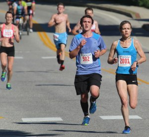 Erin Flynn (left 2015) has leader Kristin Barry (2001) in her sights.