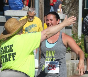 Jennifer Smith stops to greet a friend