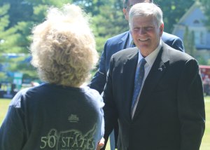 Franklin greets an attendee