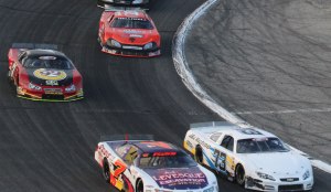 Travis on the high side and Wayne on the inside early in the race