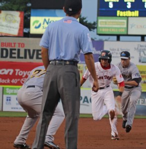 Mauricio Dubon caught in a rundown after driving in a run
