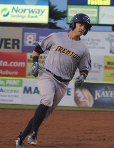 Mark Payton touches them all after a 2-run homer