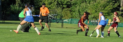 Kaitlyn Plummer (5) sends a shot past the Rangers defense