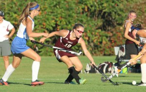 Kendyl Ridlon (left) covers Ella Novick (18)