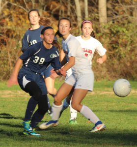 Virginia Vienneau (39) chases a loose ball