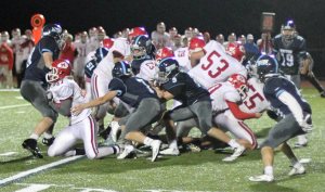 Tim Beliveau (23) followed excellent blocking for two first downs late in the game.