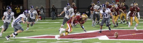 Myles Maloof (9) chases his own fumble.