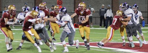 Jack McCarthy (58) and John Falasca (75) sack Rob Shay.