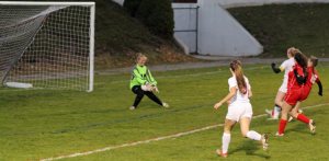 Mollie Lynch gets a point-blank shot off on Hawks goalie Melissa Fonseca
