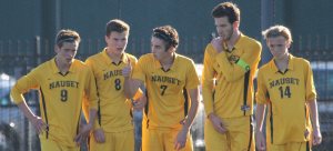 Nauset defenders await a direct kick