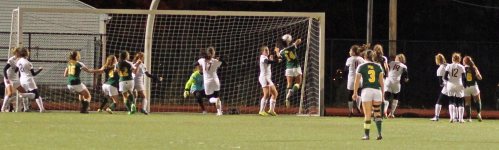 Marissa Zarella (14) gets a head on a corner kick