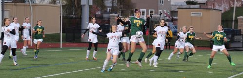 Haley Nathan (11) traps a ball