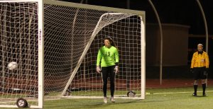 Audra Greenblott's PK is past disappointed NR goalie Kat Hassapis