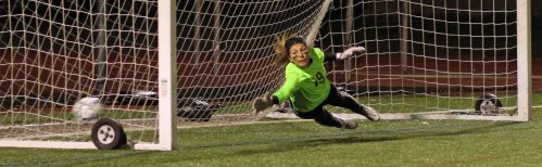 Kat Hassapis dives for Margaret Cote's successful PK