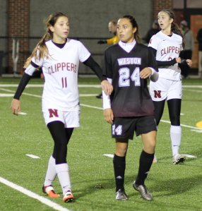 Margaret Cote (11) scored a goal and played tight defense on Karenna Groff