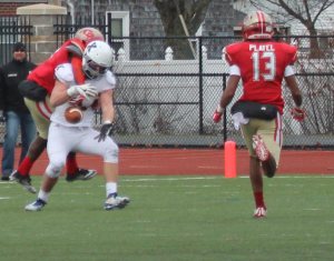 Cal Flanders (94) somehow catches this pass with an Everett defender on his back