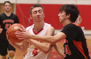 Ryan Patterson (4) defended by Jason Finkst
