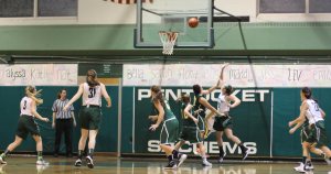 Liv Cross (32) makes a layup