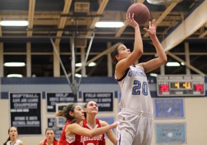 Tessa Lafrance puts in a rebound