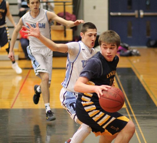 Billy Arseneault (22 points) guarded by Dylan Shute