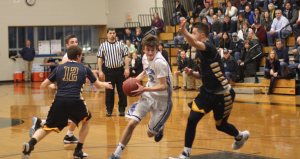 Colin Brennan (16 points) to the hoop