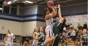 Bella Pomeroy defends a Tessa Lafrance layup attempt