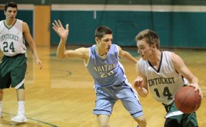 Gus Flaherty (10 points) drives on Dylan Shute