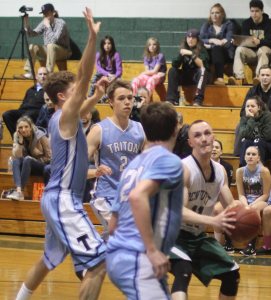 Conor O'Neil triple-teamed